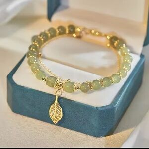 Gold and Green Beaded Bracelet jade with Leaf Charm